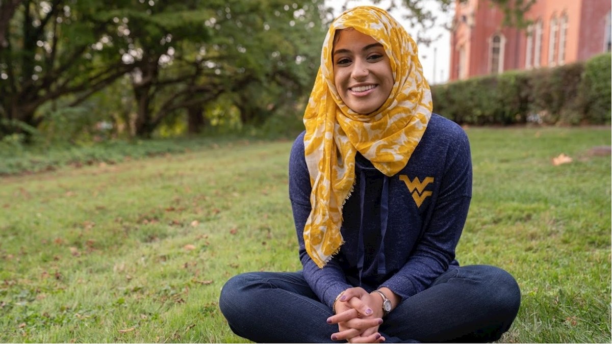 Mizbah Muzaffer poses for a photo on WVU's downtown campus.