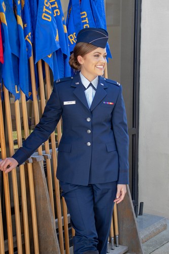 Alumna Bethany Linkous smiles for a picture after completing captain's training in the Air Force.