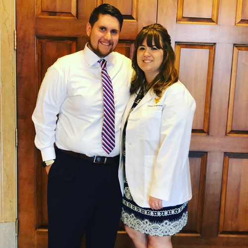 Rebecca Baudin is a 2020 dental graduate. She poses with her husband Hunter.