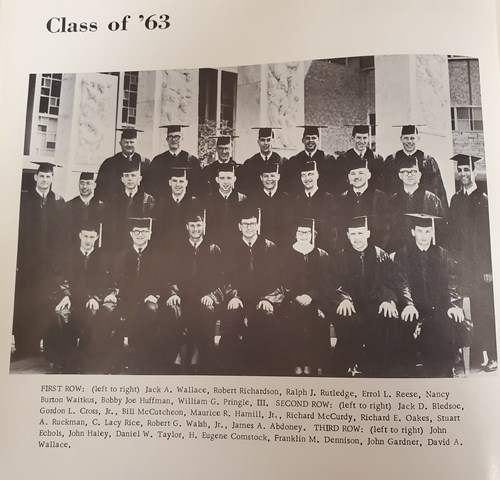 The DDS Class of 1963 included the first female graduate of the school. She's pictured in cap and gown with her classmates.