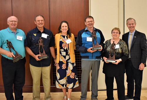Three of the first dentists to support the rural rotation program receive awards.